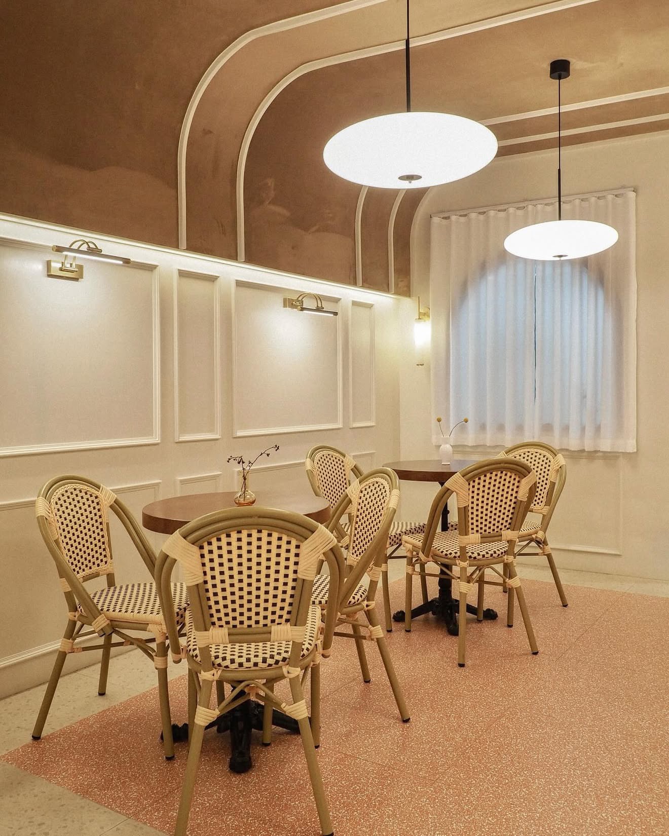 Chairs beneath the vaulted ceiling