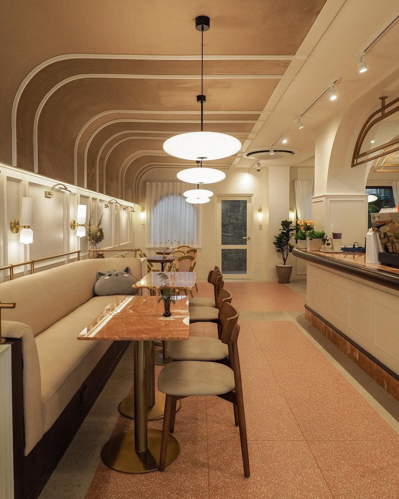 The long marble counter and banquette
